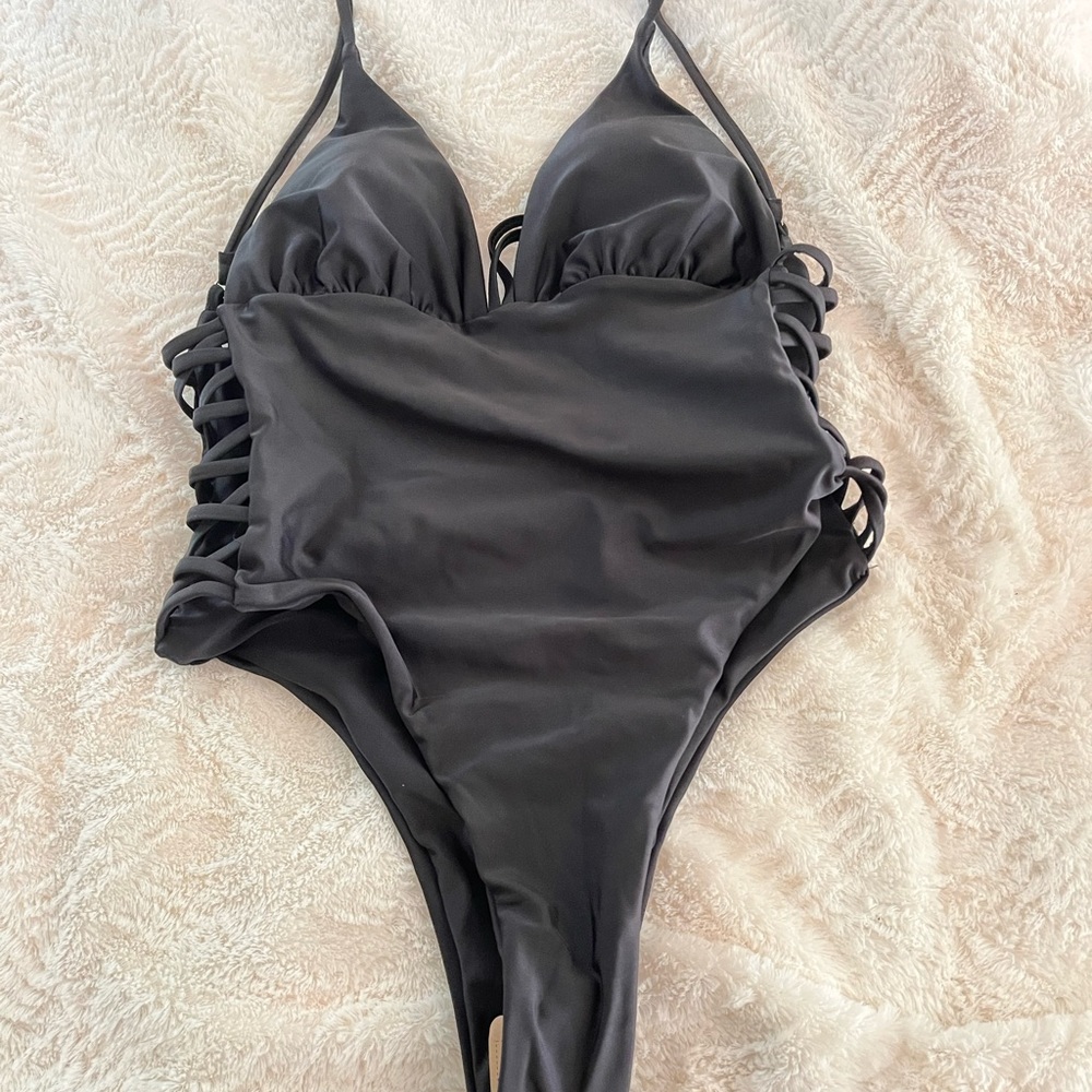 New without tags one piece bathing suit; size large